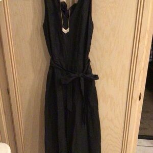 Black jumpsuit with necklace